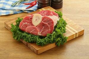 Raw ossobuco beef meat for cooking photo