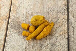Indian spices - Turmeric root Curcuma photo