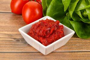 Tomato puree sauce for cooking photo