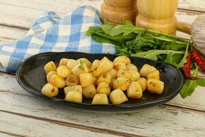 Roasted delicous scallop in the bowl photo