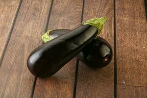 Two Fresh ripe black eggplants photo