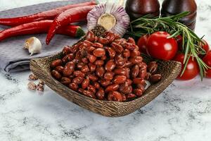 Red canned beans in the bowl photo