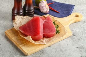 Delicous raw tuna steak for cooking photo