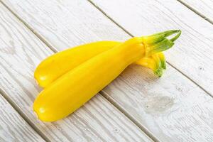 Yellow young zucchini for cooking photo