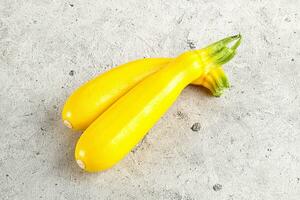 Yellow young zucchini for cooking photo