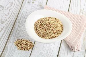 Raw dry quinoa cereal grain photo