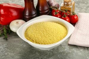 Raw dry wheat couscous grain photo