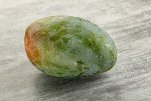 Ripe sweet green tropic mango photo