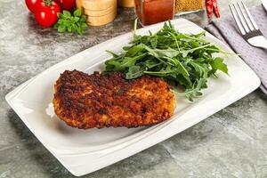 Tasty roasted breaded meat schnitzel photo