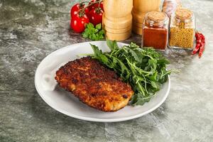 Tasty roasted breaded meat schnitzel photo