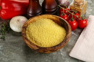 Raw dry wheat couscous grain photo