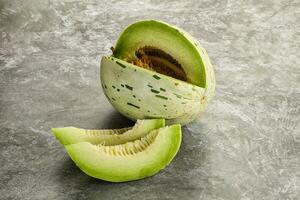 Ripe sweet and juicy dalmatian melon photo