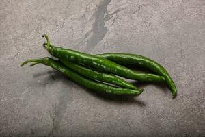 Hot and spicy green chili pepper photo