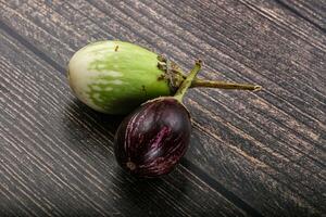 Heap of raw asian baby eggplant photo