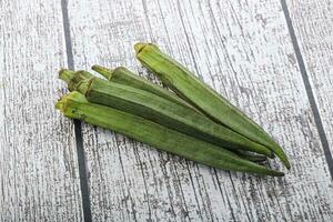 Green ripe tasty okra tropical vegetable photo