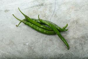 Hot and spicy green chili pepper photo