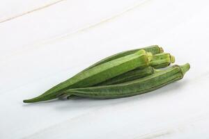 Green ripe tasty okra tropical vegetable photo