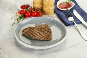 Grilled marble beef steak with sauce photo