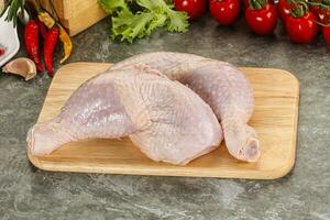 Raw chicken leg foe cooking photo