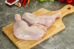 Raw chicken leg foe cooking photo