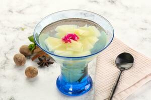 Sweet pineapple jelly with mint photo