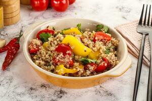 Dietary vegetarian quinoa with vegetables photo