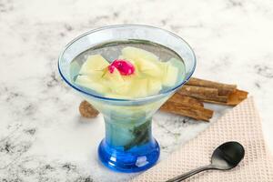 Sweet pineapple jelly with mint photo