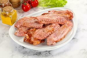 Marinated Duck wings for barbecue photo