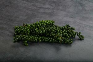 Fresh ripe green peppercon heap photo