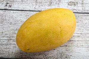 Sweet ripe juicy tropical mango fruit photo