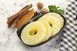 Sweet Canned pineapple in the bowl photo