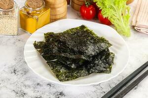 Korean cuisine - Nori chips in the bowl photo