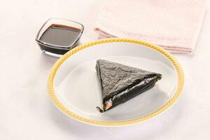 Japanese traditional onigiri with fish photo