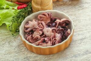 Marinated baby octopus seafood in the bowl photo