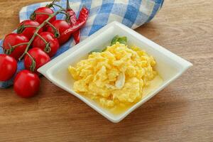 Scrambledd egg in the bowl photo