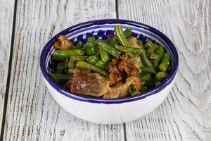 Roasted bacon with green bean photo