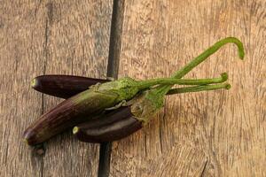 Baby organic purple eggplant heap photo