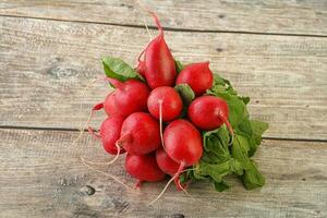 Heap ripe fresh red radish photo