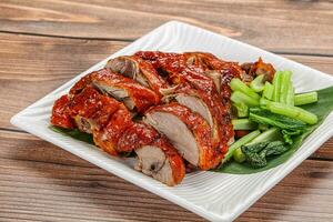 Asian cuisine - roasted duck with skin photo