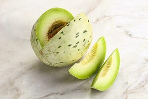 Ripe sweet and juicy dalmatian melon photo