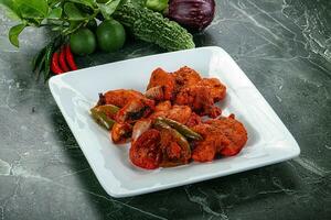 Indian cuisine - chicken tikka barbecue photo