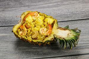 Thai cuisine - rice with prawn in pineapple photo