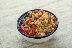 Arabic cous cous with meat and tomato photo