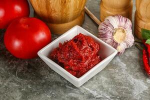 Natural organic red tomato paste photo