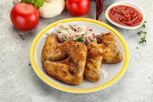 Grilled chicken wings with sauce photo