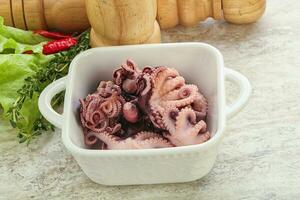 Marinated baby octopus seafood in the bowl photo