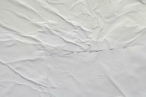 Blank white crumpled and creased paper poster texture background photo