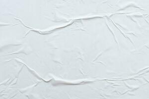 Blank white crumpled and creased paper poster texture background photo