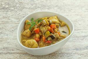 Thai yellow curry with chicken photo