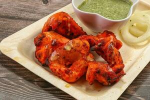 Indian cuisine - Chicken tikka barbecue photo